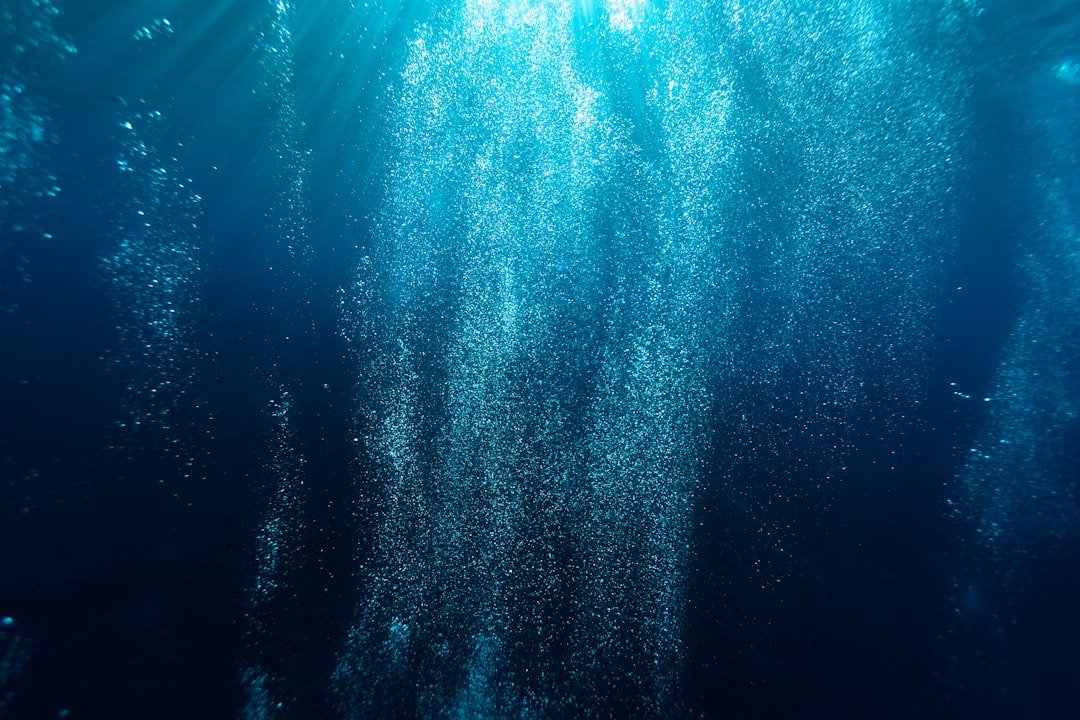 beginner diver bubbles underwater