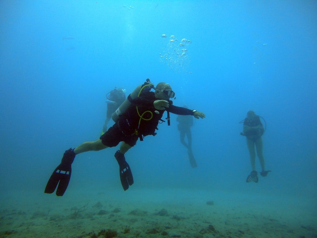 scuba diving buddies underwater