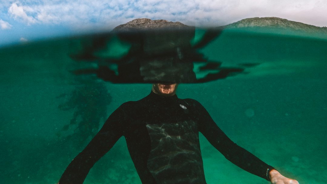 diver in wetsuit underwater